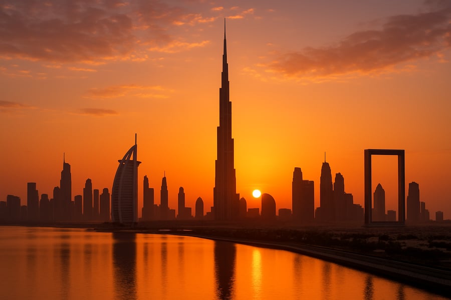 Dubai skyline at sunset with famous landmarks Dubai skyline at sunset with famous landmarks